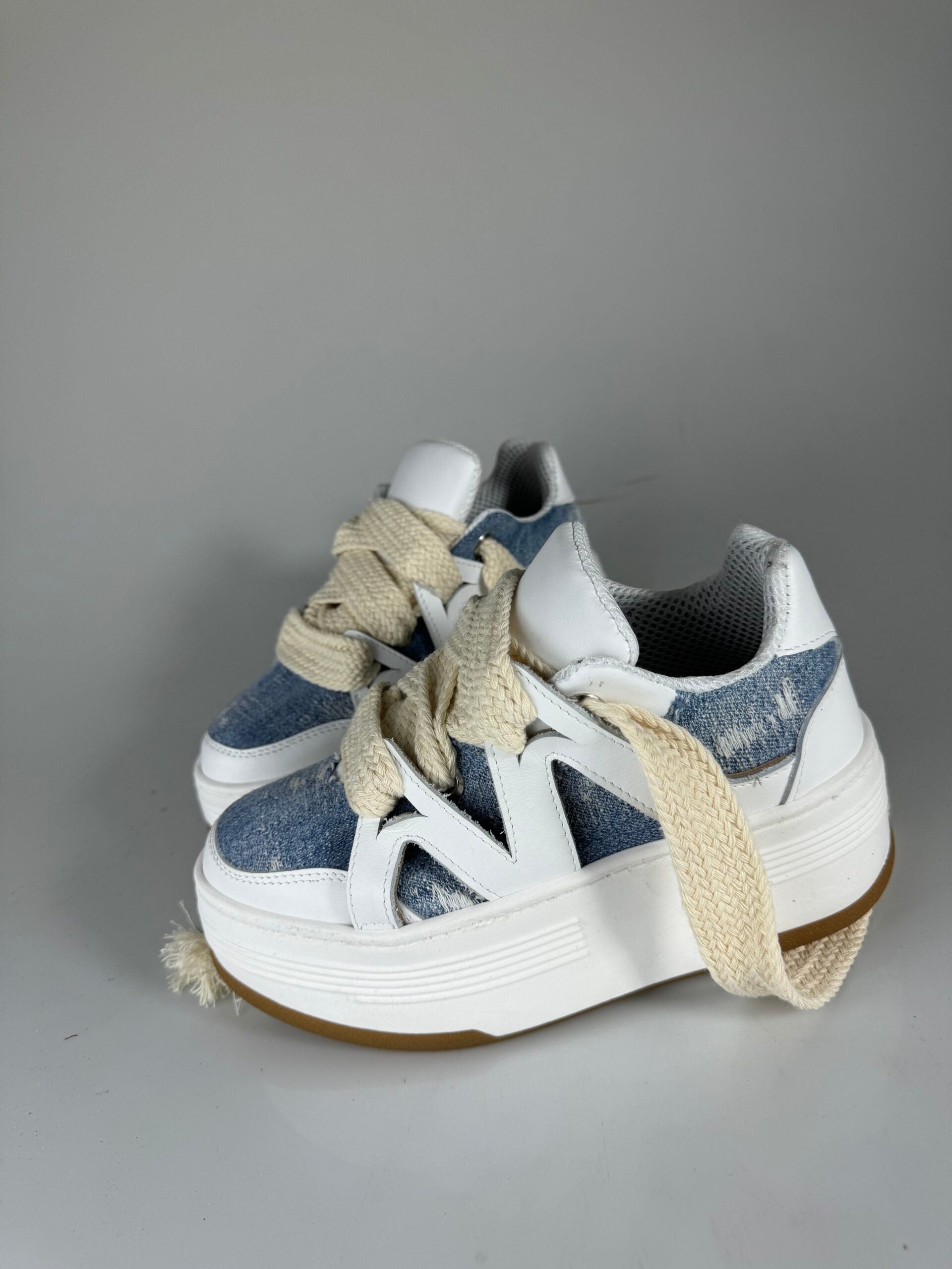 Wolf5 white leather rip jeans