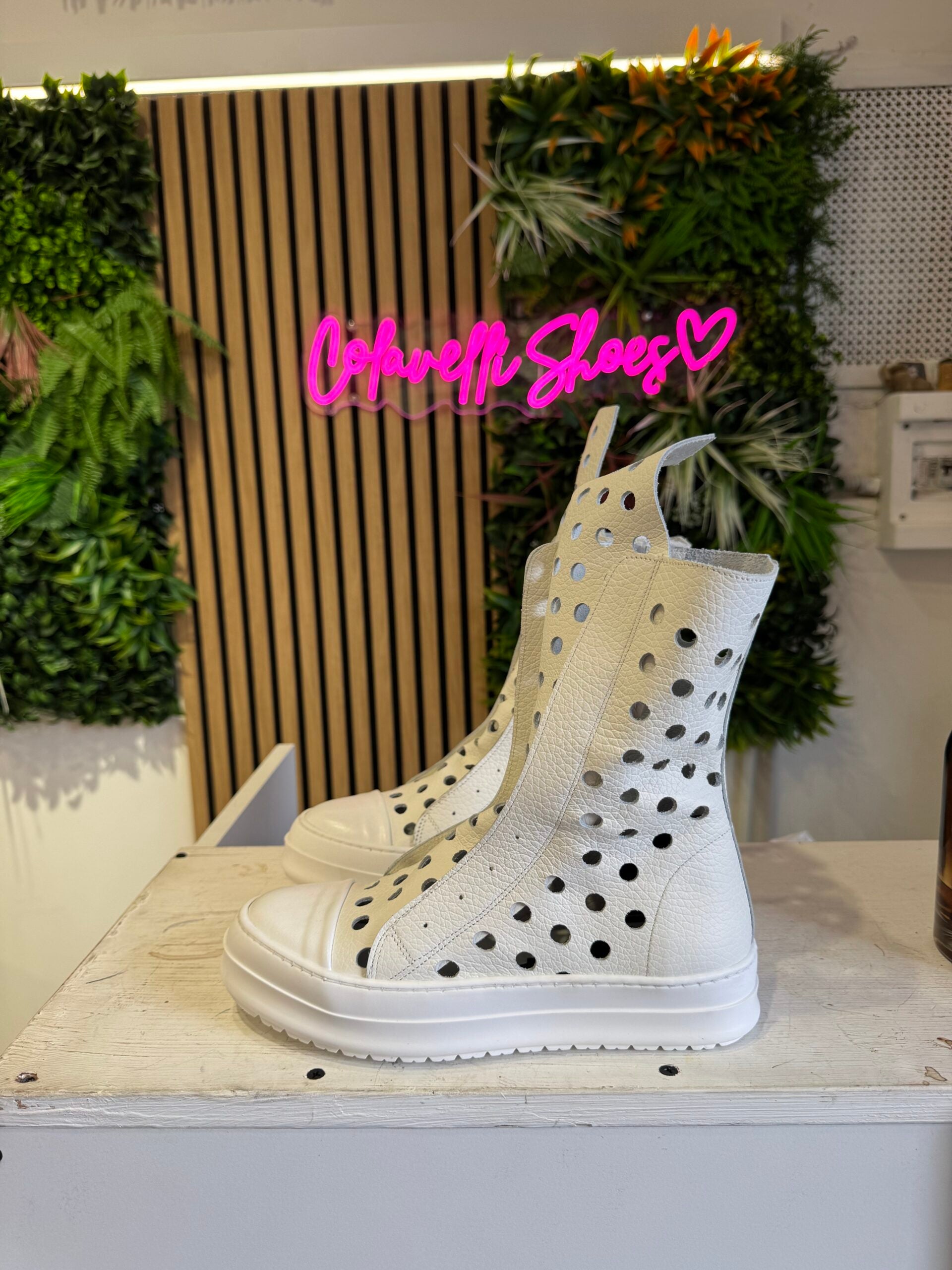 perforated white leather bull